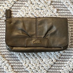 COACH clutch in dark bronzed gold